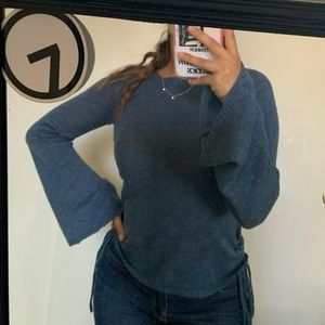 blue long sleeve with ties on the sides